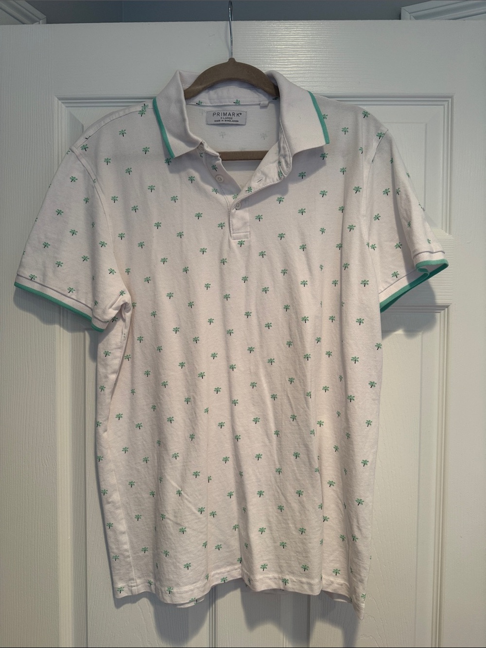 Primark White Polo with Green Palm Motif